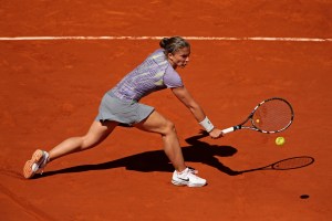 Sara Errani of Italy plays a backhand during her Women's Singles quarter-final match against Agnieszka Radwanska at the 2013 French Open at Roland Garros in Paris, France. (Photo by Clive Brunskill/Getty Images)