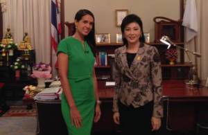 CNN's Kristie Lu Stout (left) with the first female Prime Minister of Thailand, Yingluck Shinawatra (right)