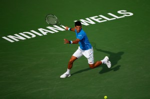 INDIAN WELLS, CA - MARCH 22: Novak Djokovic of Serbia in action against Roger Federer of Switzerland in the final during day fourteen of the BNP Paribas Open tennis at the Indian Wells Tennis Garden on March 22, 2015 in Indian Wells, California. (Photo by Julian Finney/Getty Images)